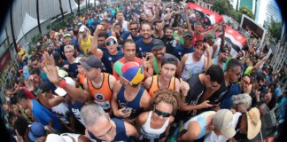 com-disposicao-e-alegria,-corredores-anonimos-agitam-a-sao-silvestre